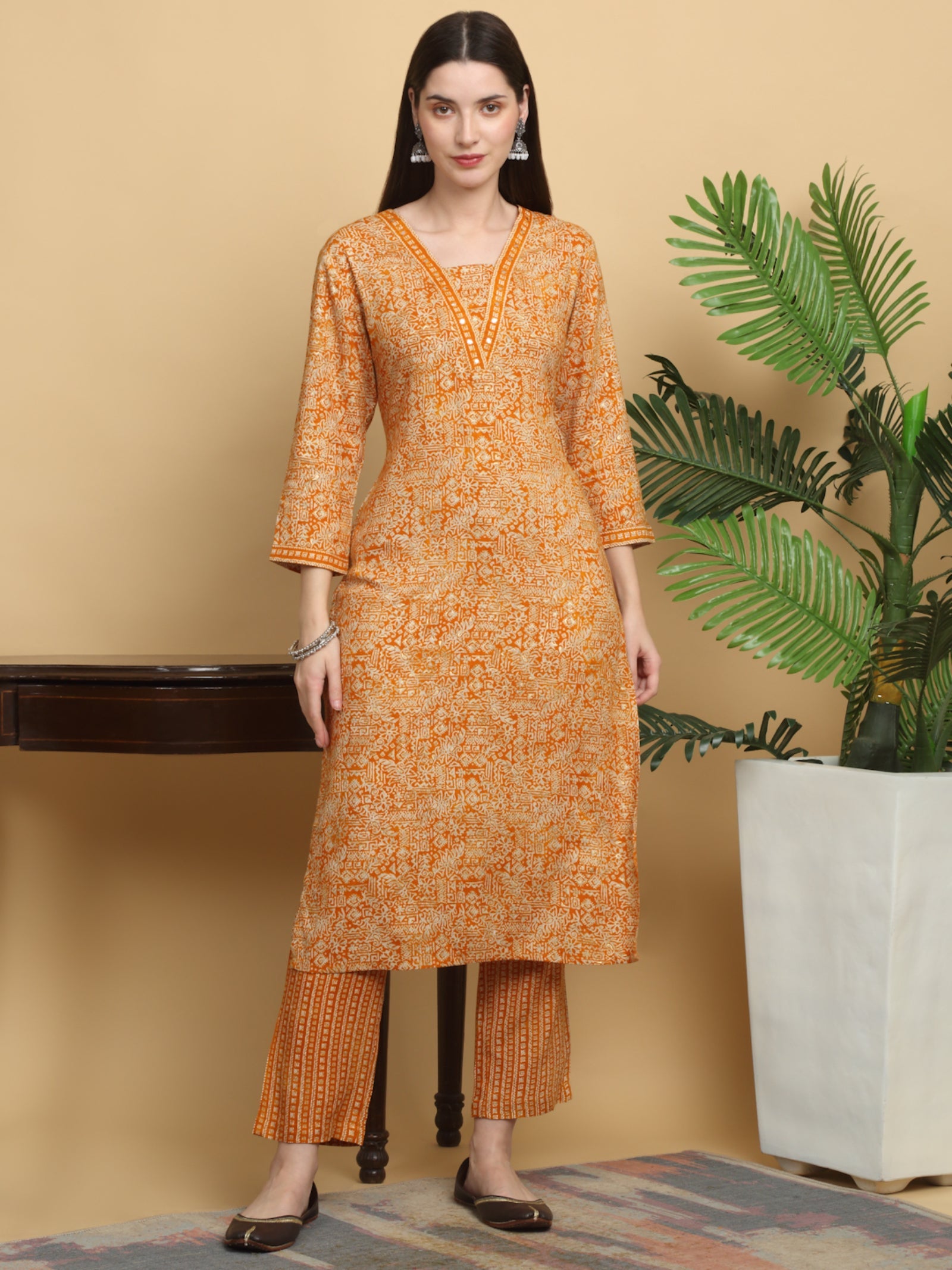 Maluka Women’s Mustard & Red Ethnic Motif Rayon Mirror Work Kurta Set