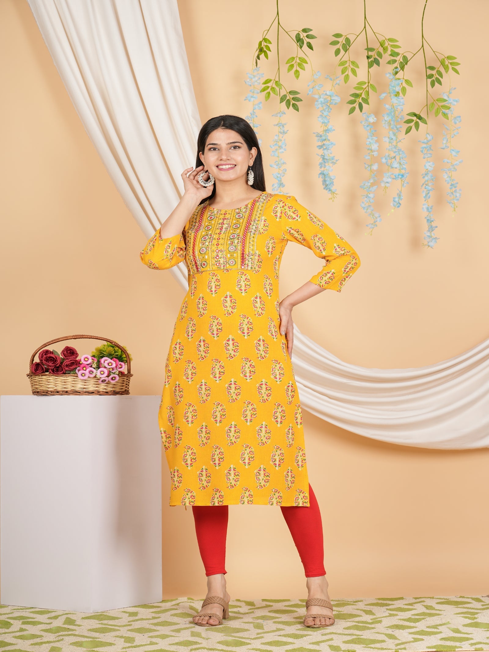 Maluka Women’s Yellow Floral Rayon Straight Kurta with Embroidery & Mirror Work