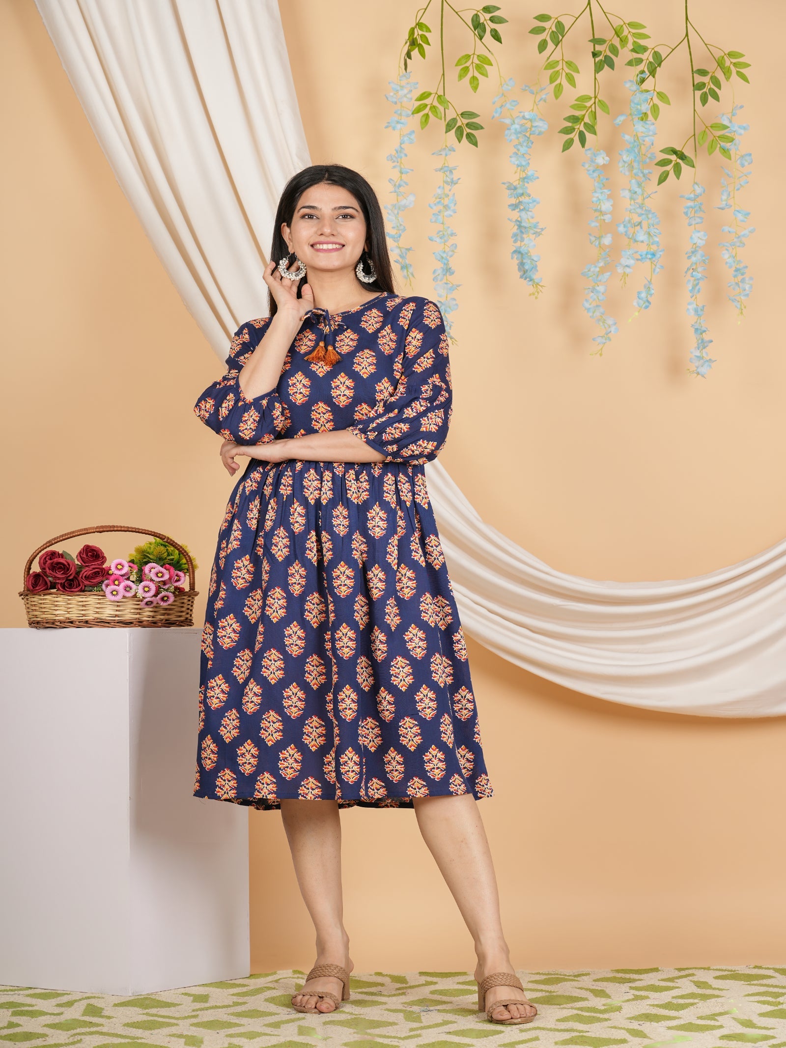 Maluka Women’s Navy Blue Floral Rayon A-Line Kurta with Tassels