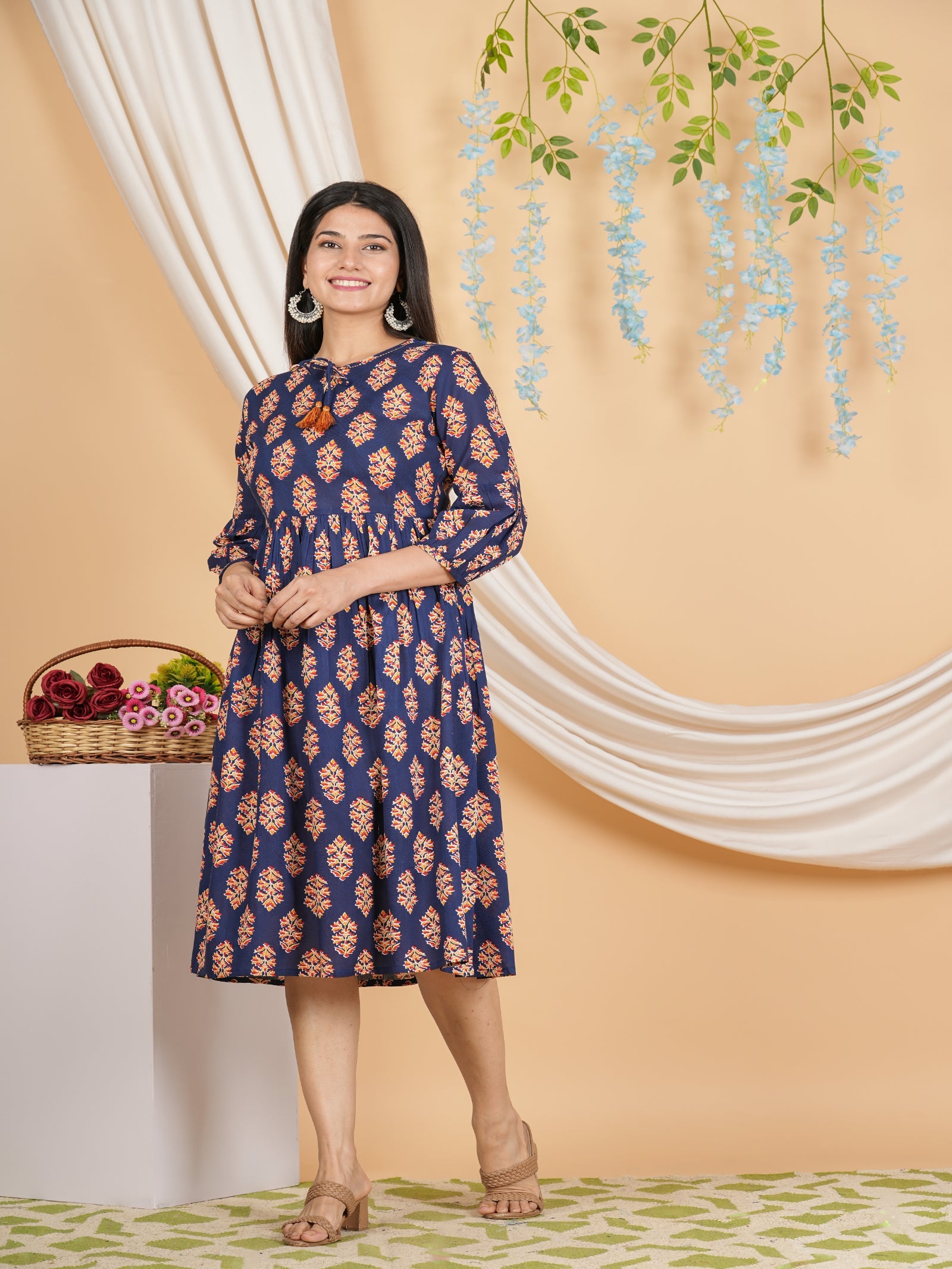 Maluka Women’s Navy Blue Floral Rayon A-Line Kurta with Tassels