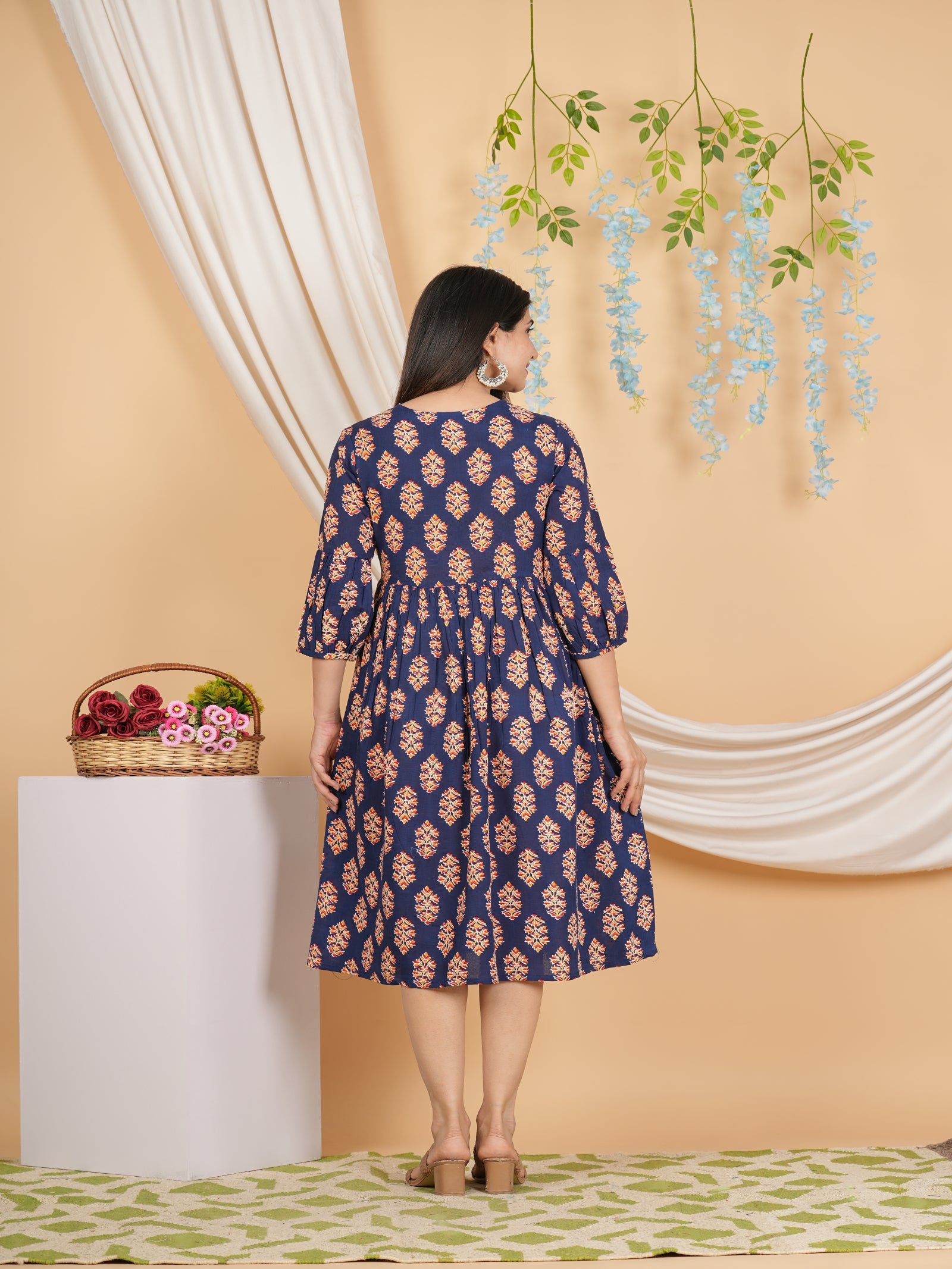 Maluka Women’s Navy Blue Floral Rayon A-Line Kurta with Tassels