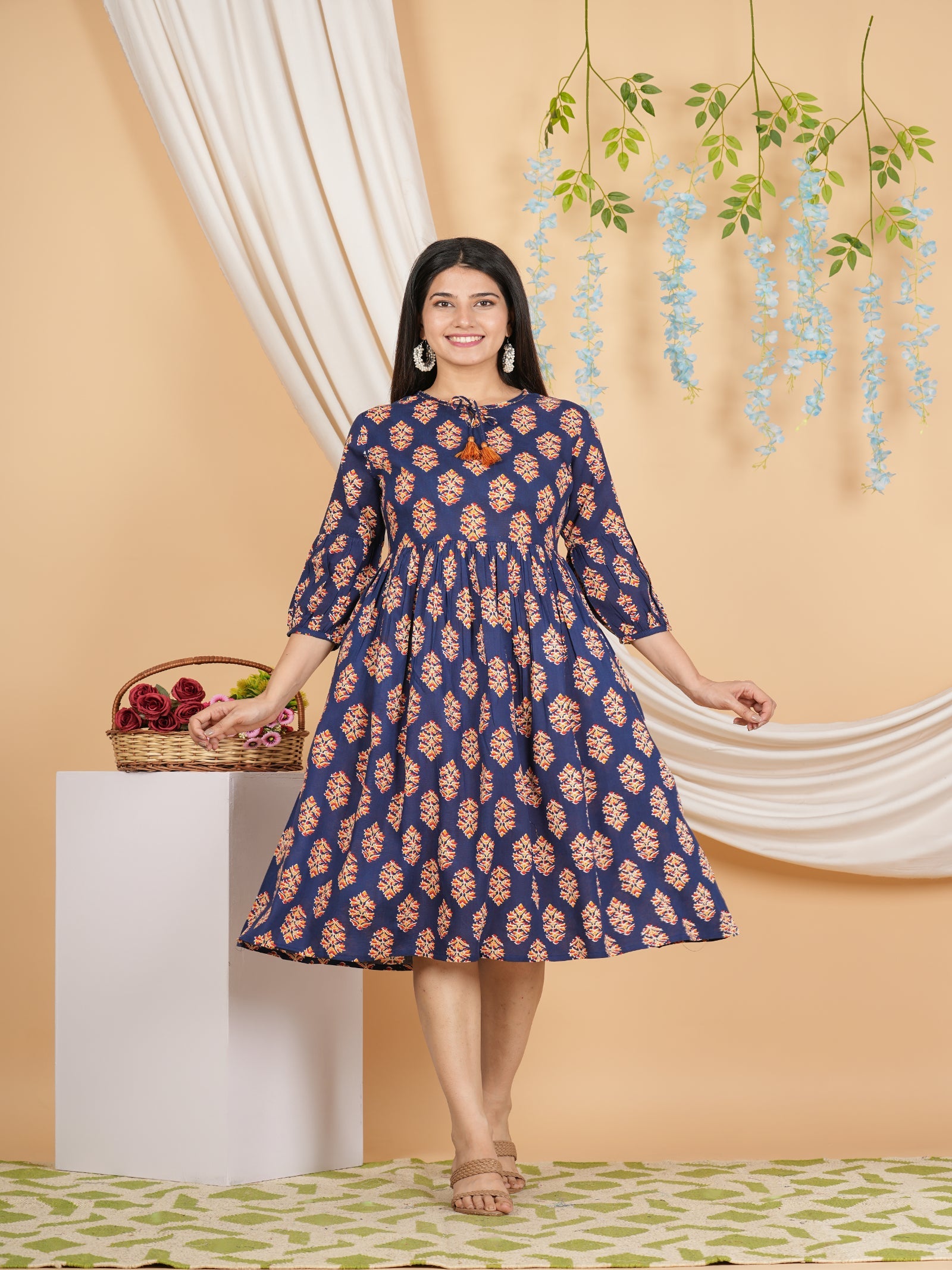 Maluka Women’s Navy Blue Floral Rayon A-Line Kurta with Tassels