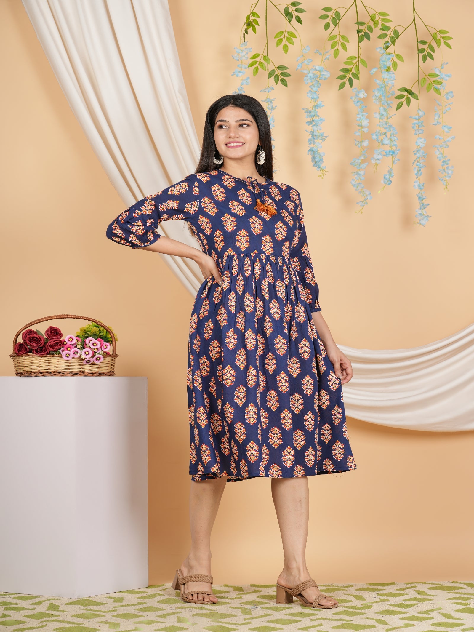 Maluka Women’s Navy Blue Floral Rayon A-Line Kurta with Tassels